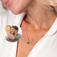 Thumbnail for Wings Photo Necklace featuring personalized photo, elegant angel wings by Brother & Sisters, perfect keepsake jewelry.