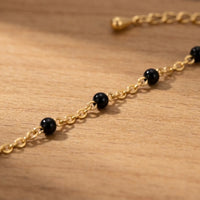 Thumbnail for Gold & Onyx Bead Anklet features glossy black enamel beads on an 18K gold-plated chain by Brother & Sisters.