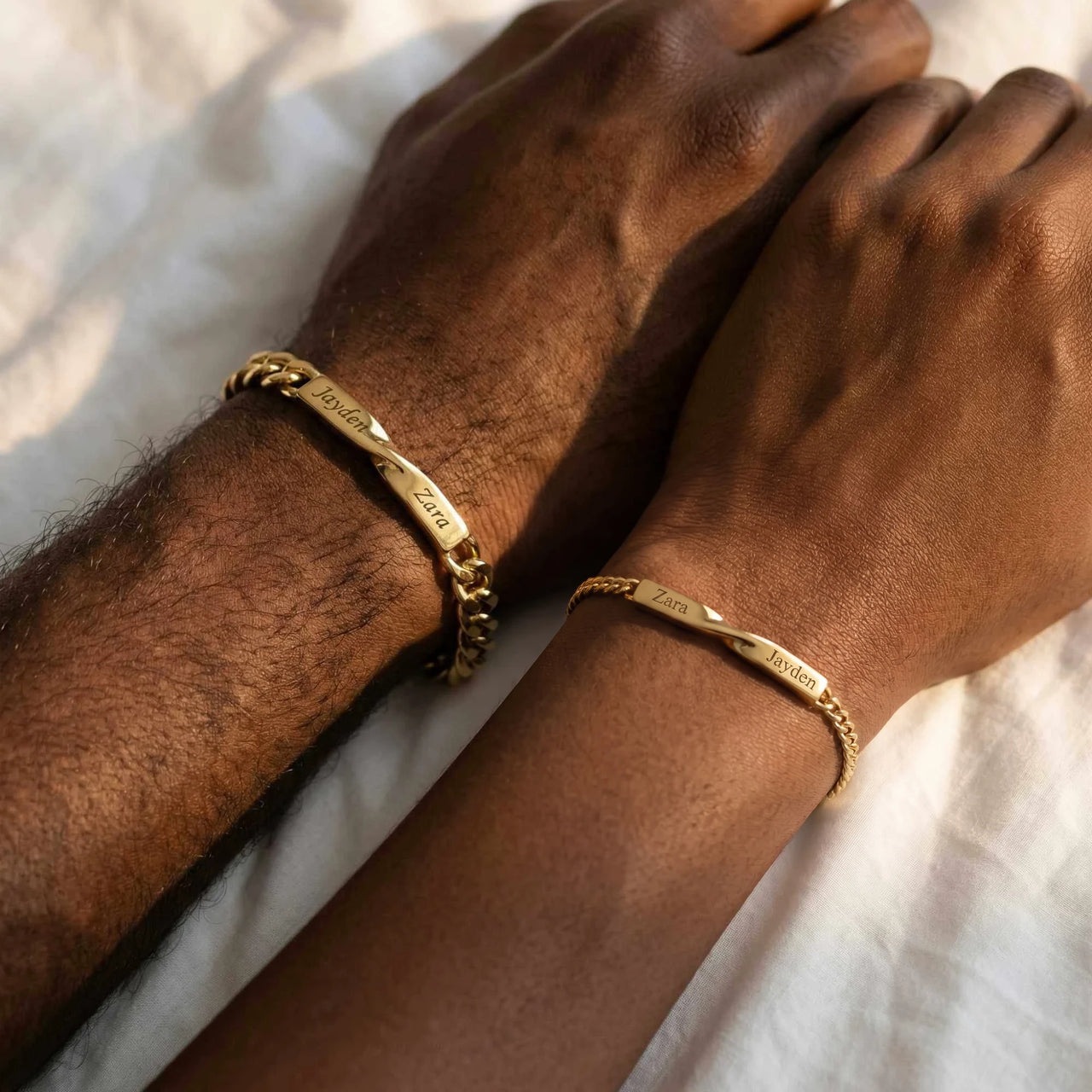 Infinity Bond Matching Bracelet by Brother & Sisters featuring two name-engraved twisted bars in gold.
