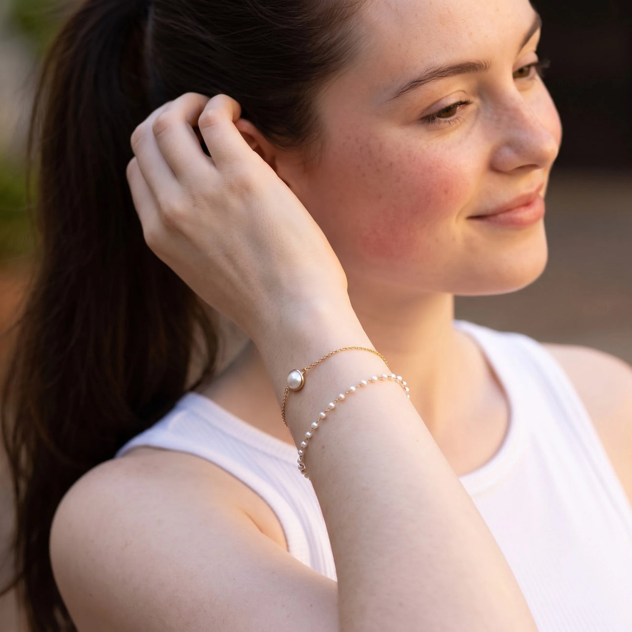 The Pure, gold bracelet — worn gesture | SKU: l-epure