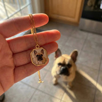 Thumbnail for Customer photo: the gold octagon necklace with her bulldog's photo, her dog in the background | SKU: TPH-OCTN-GOLD